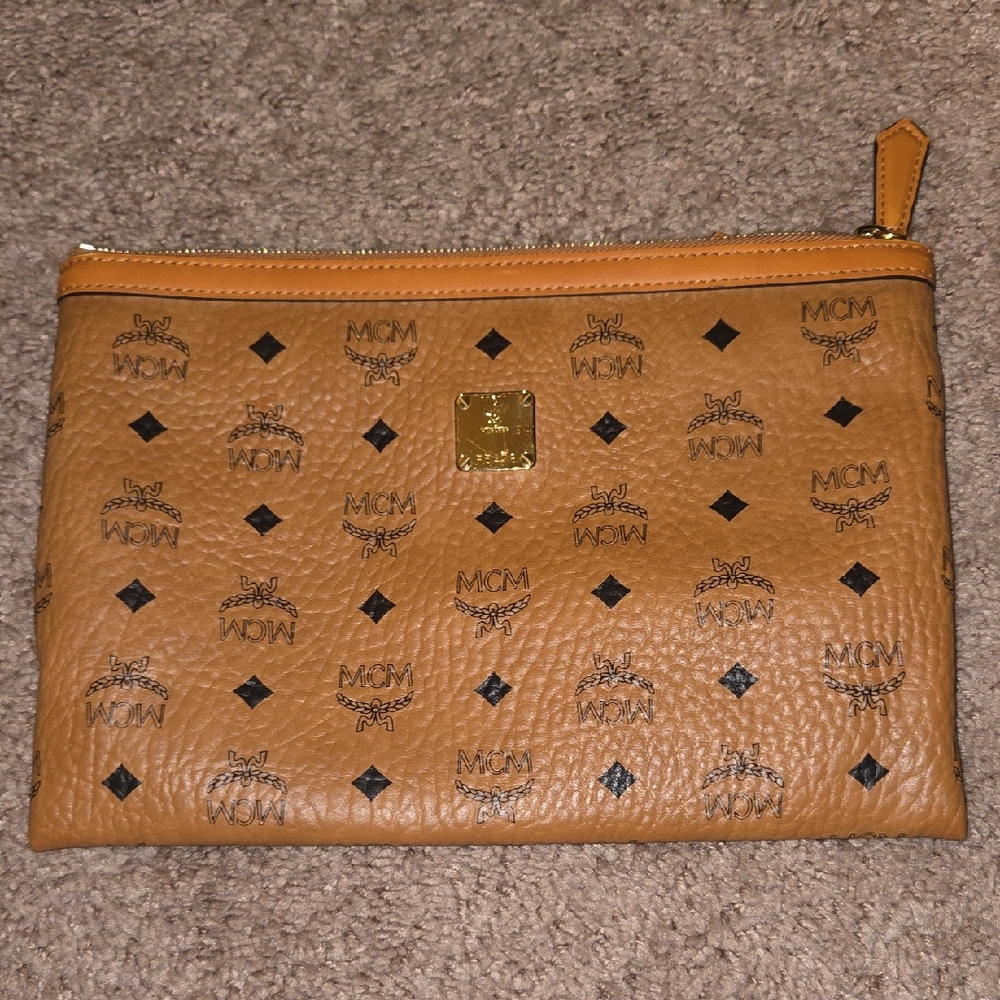 MCM Cognac Leather Clutch with Logo Pattern